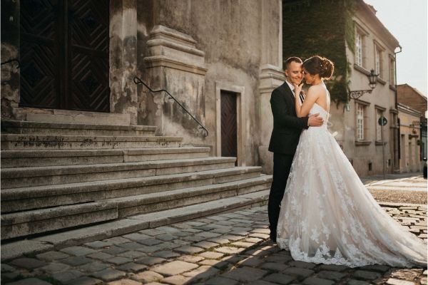 old city wedding couple embracing