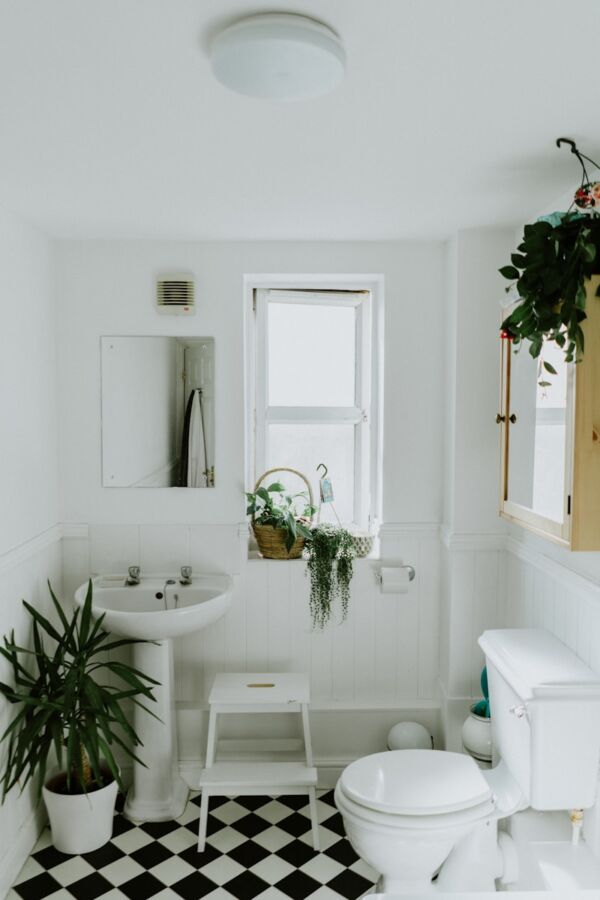 white ceramic pedestal sink cozy feel