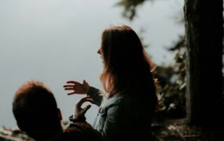 woman wearing gray jacket