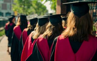 a group of people wearing graduation gowns