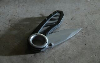 silver and black hand tool